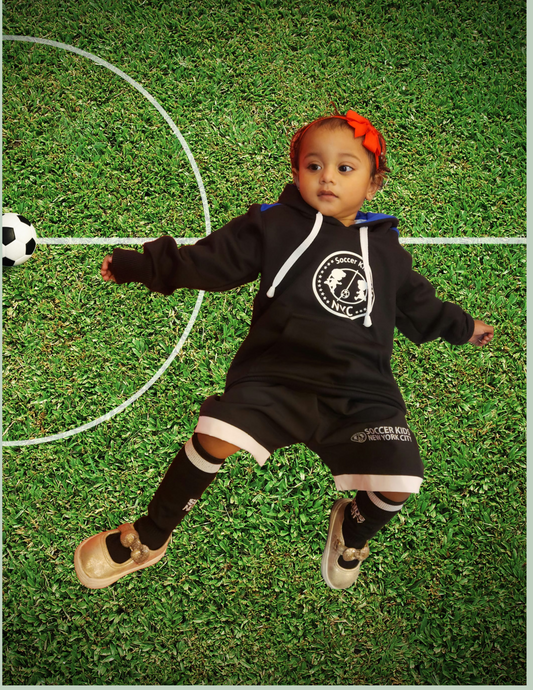 2T fitting on a 24 months child; matching size socks and shorts with elastic waistbands